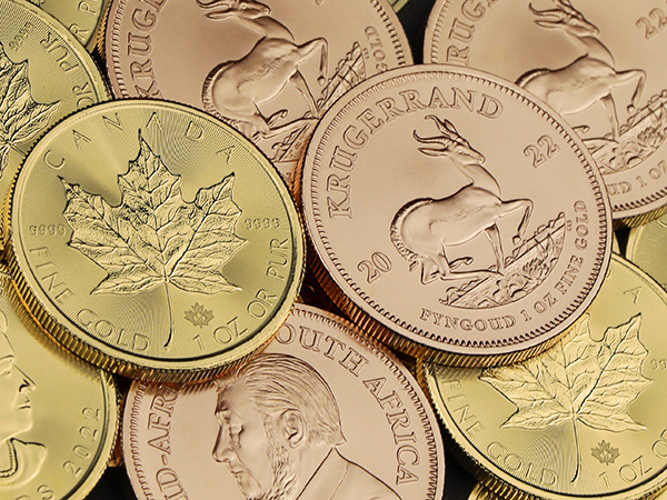 1oz Goldmünzen Krügerrand und Maple Leaf 