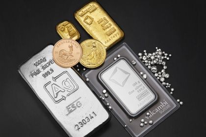 Silberbarren und Goldbarren, sowie Bullionmünzen