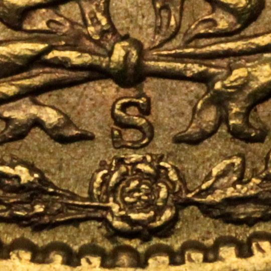 Prägezeichen S Sydney unterhalb des Wappens auf der Australischen Sovereign Goldmünze von Königin Victoria.