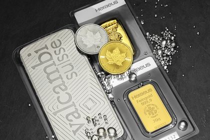 Edelmetall: Barren und Münzen aus Gold und Silber