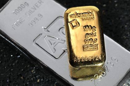 Gegossene Goldbarren und Silberbarren von ESG und Valcambi