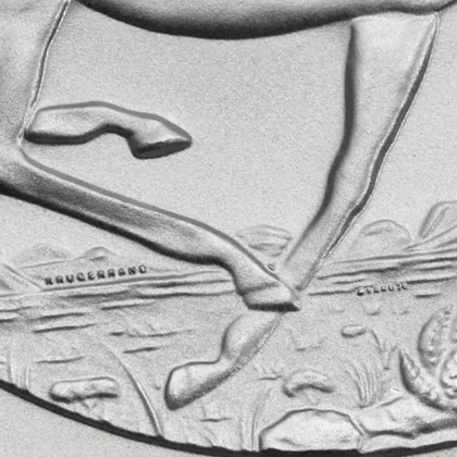 Sicherheitsmerkmal in Form eines Mikrotexts auf einer 1oz Krügerrand Silbermünze