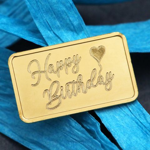 Motivgravur "Happy Birthday" auf 2,5g Gold