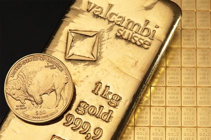Goldbarren und Goldmünzen