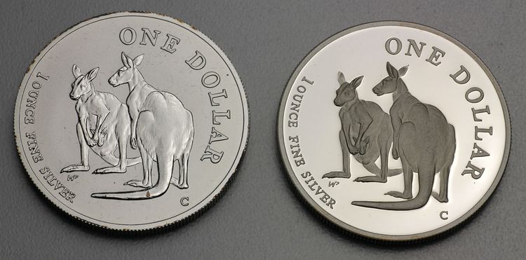 Gegenüberstellung der Proof Version polierte Platte und der normalen Stempelglanz Version Känguru Silbermünze Zahlseite