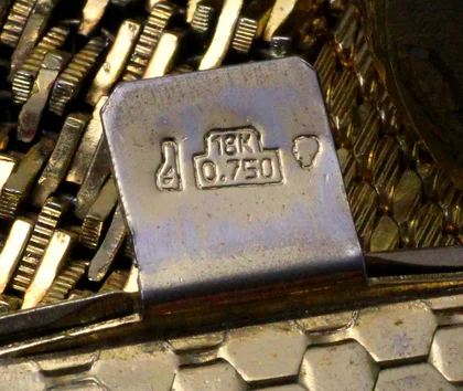 Gefälschte 18K 750er Punzierung auf Autobahngold Armband